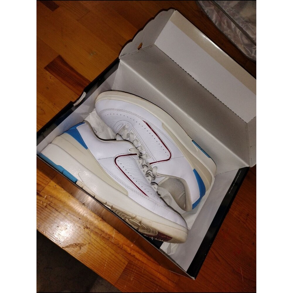 Jordan White Sneakers with Blue Heel and Red Trim